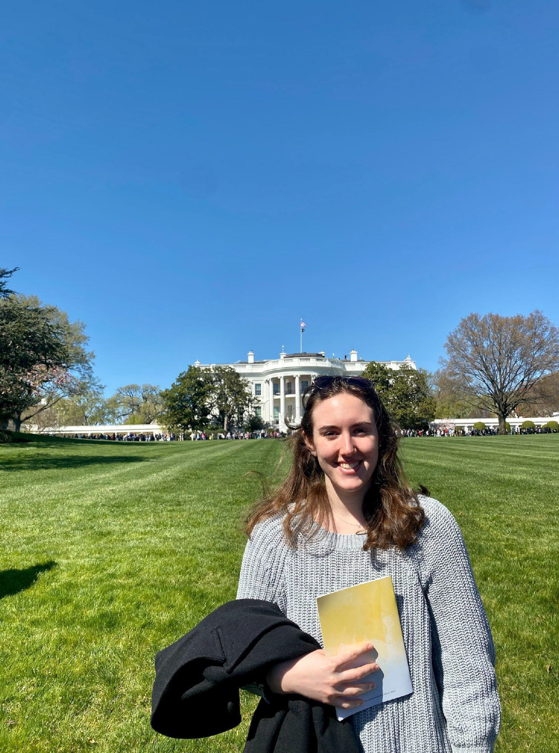 Spring 2023 UCDC Fellow Cecilia Wolfcale standing at the White House garden