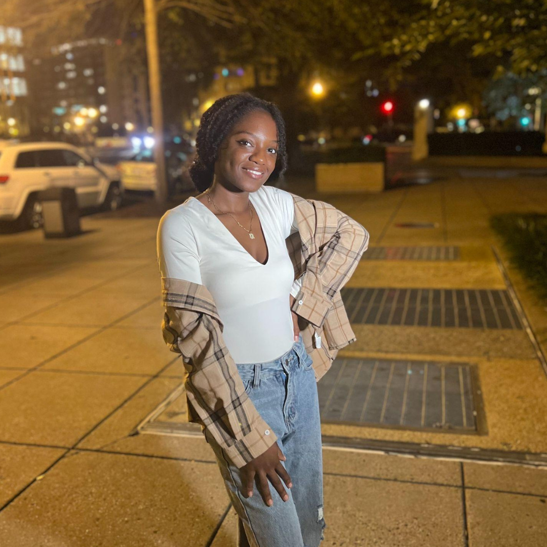 Djulia Sekariyongo-Koita standing head to toe outside in Washington D.C.