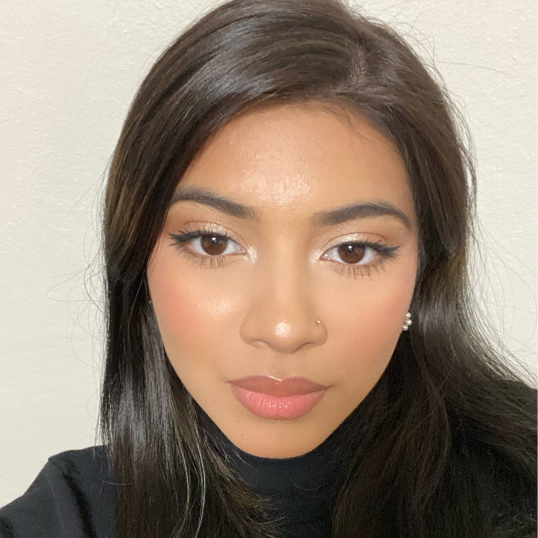 young woman's selfie in a black turtleneck