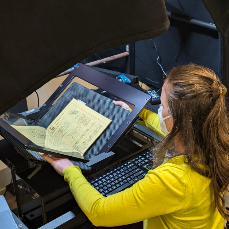 IGS Library Local Government Documents Digitization Project (LoCALDig) Internet Archive Scribe scans a booklet  