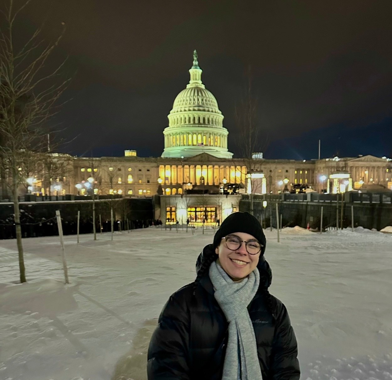 young girl smiles in the snow