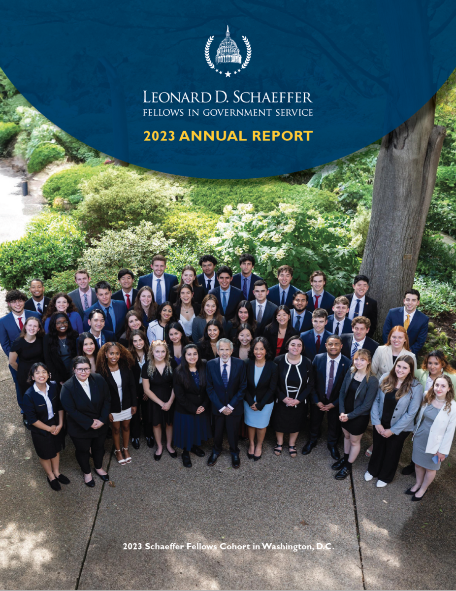 Cover page of the 2023 Annual Report, with a photo of a group of people in professional clothing