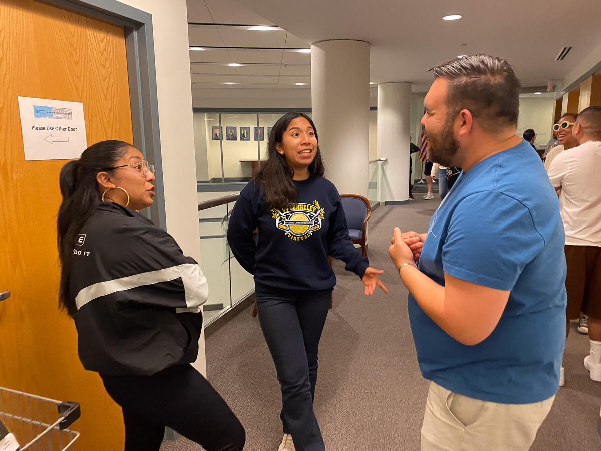 (From left) Daisy Flores (Ethnic Studies, minor in Race and the Law, ’23), Alexia Guerra, and Salvador Uribe (American Studies, minor in Ethnic Studies, ’23) practice networking during a workshop at the UC Washington Center