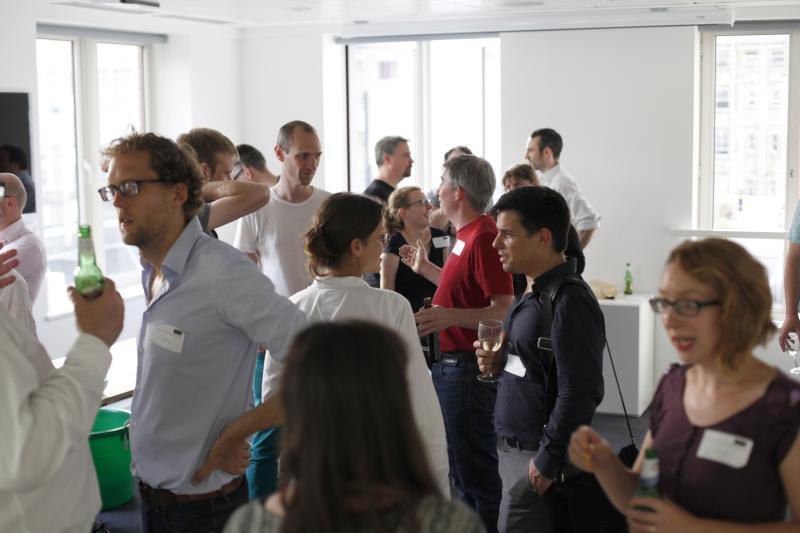 picture of a networking event in a room filled with people