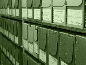 Library archival  boxes on shelves