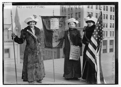 black and white photo of three suffragettes with handwriting along the margins (from left to right) Mrs. J Hardy Stubbs, Miss Ida Craft, Miss Rosalie Jones