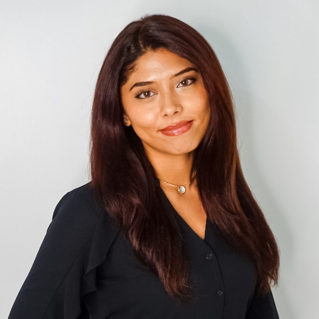 Arianna Laolagi young girl with light hazel eyes and dark red hair