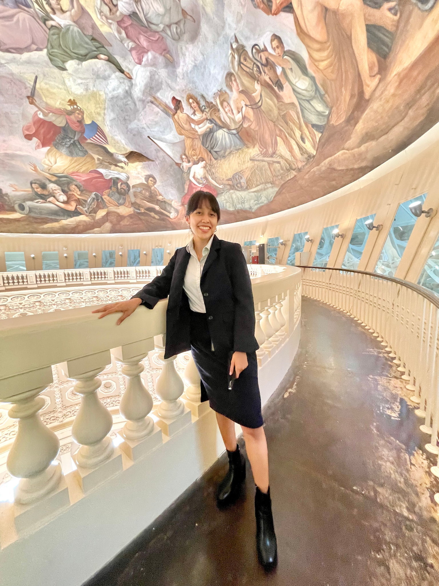Anna Lorenzo standing from head to toe in the Library of Congress in Washington D.C.