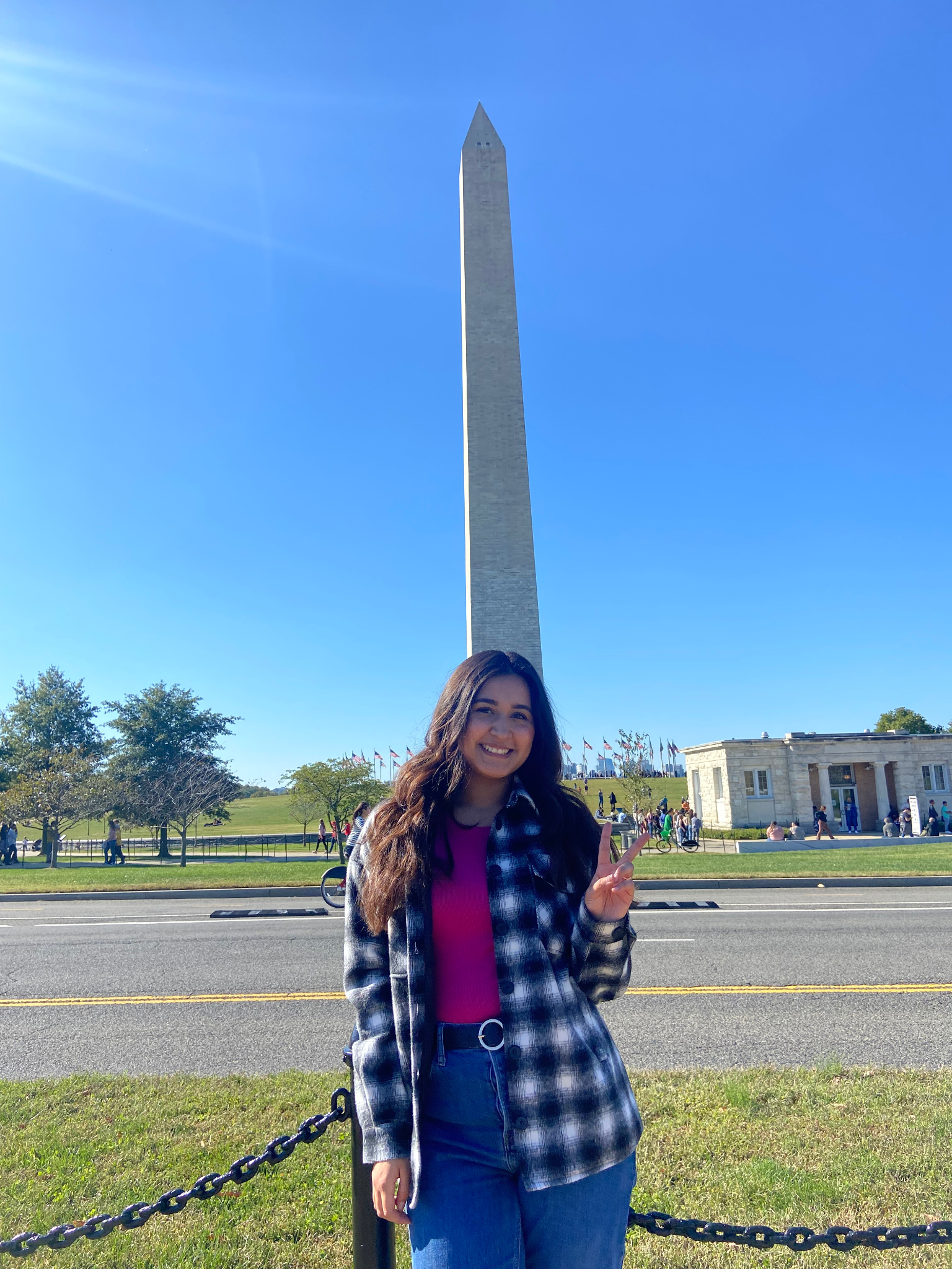 Jennifer Ramirez standing in front of the Washington Monument in Washington D.C.