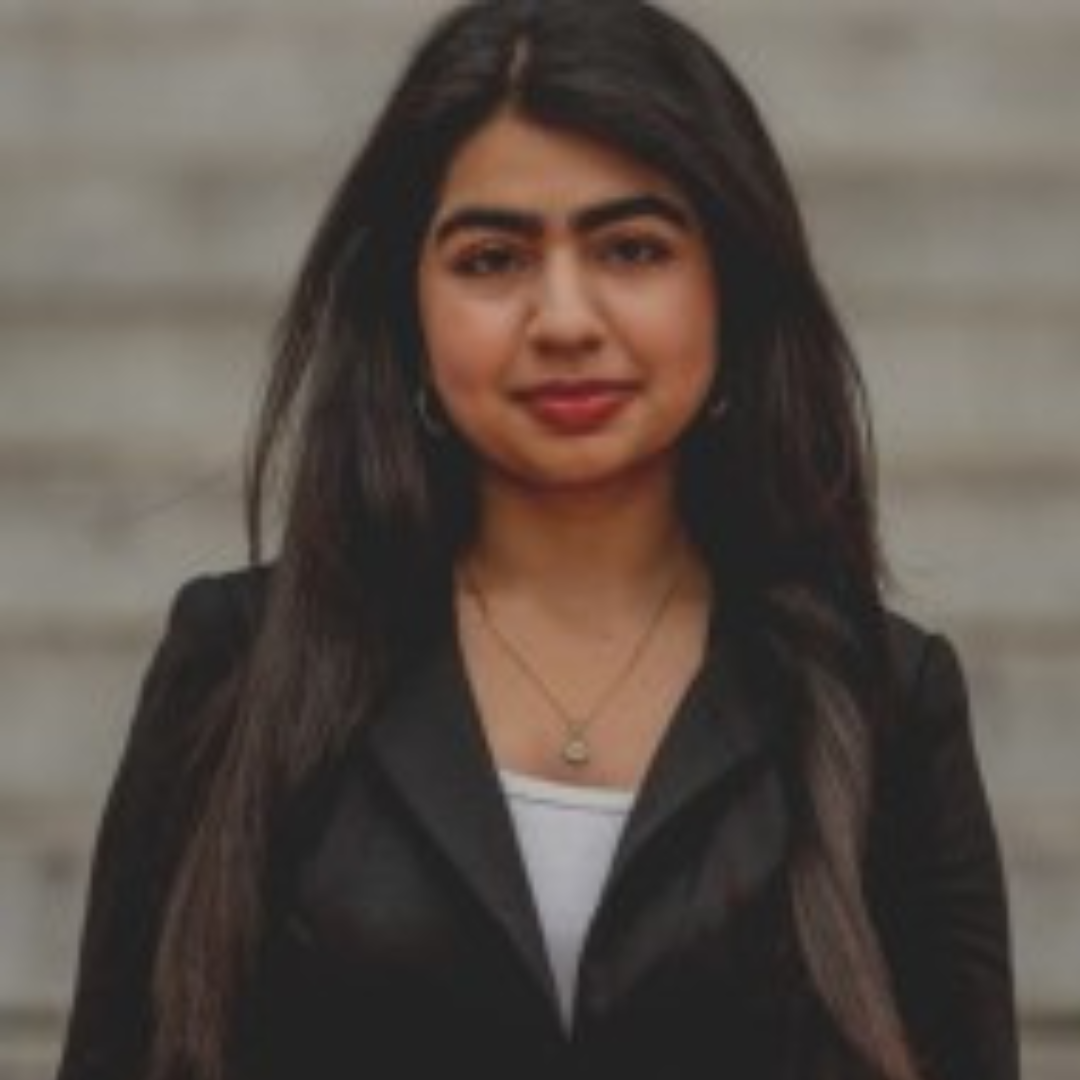 young woman in a blazer and a white shirt